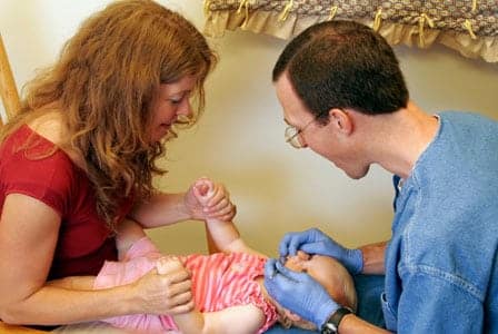 Holding your child's hand during their first few visits can help them relax in an unfamiliar environment.