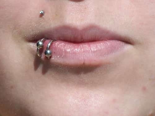 the Madonna and Spider/Viper Bite lip piercings.
