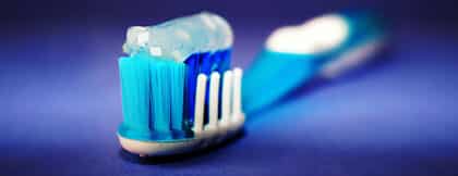 toothbrush with fluoride toothpaste