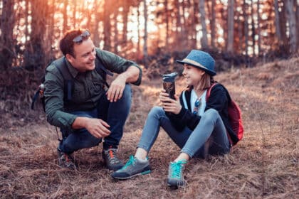 Guy and girl smiling with teeth